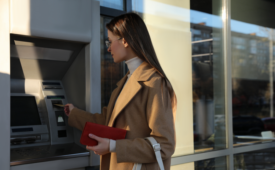 Woman using an ATM